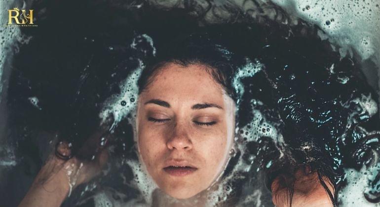 Damp your hair with water